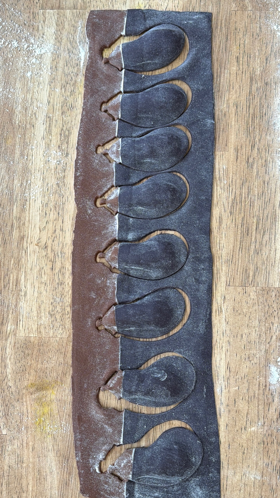 Eggplant ravioli cut from cocoa dough