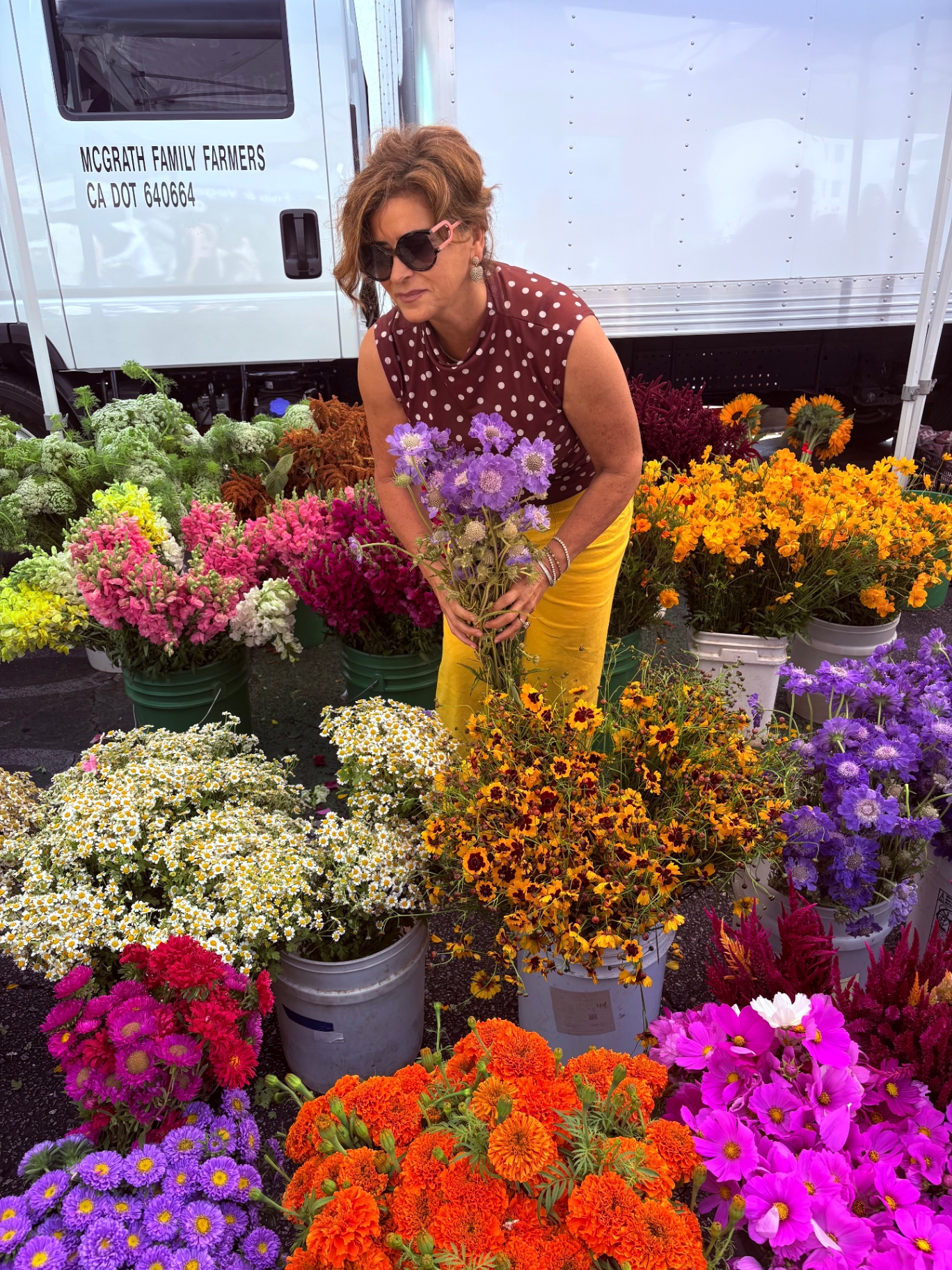 Fiona gathering purple flowers