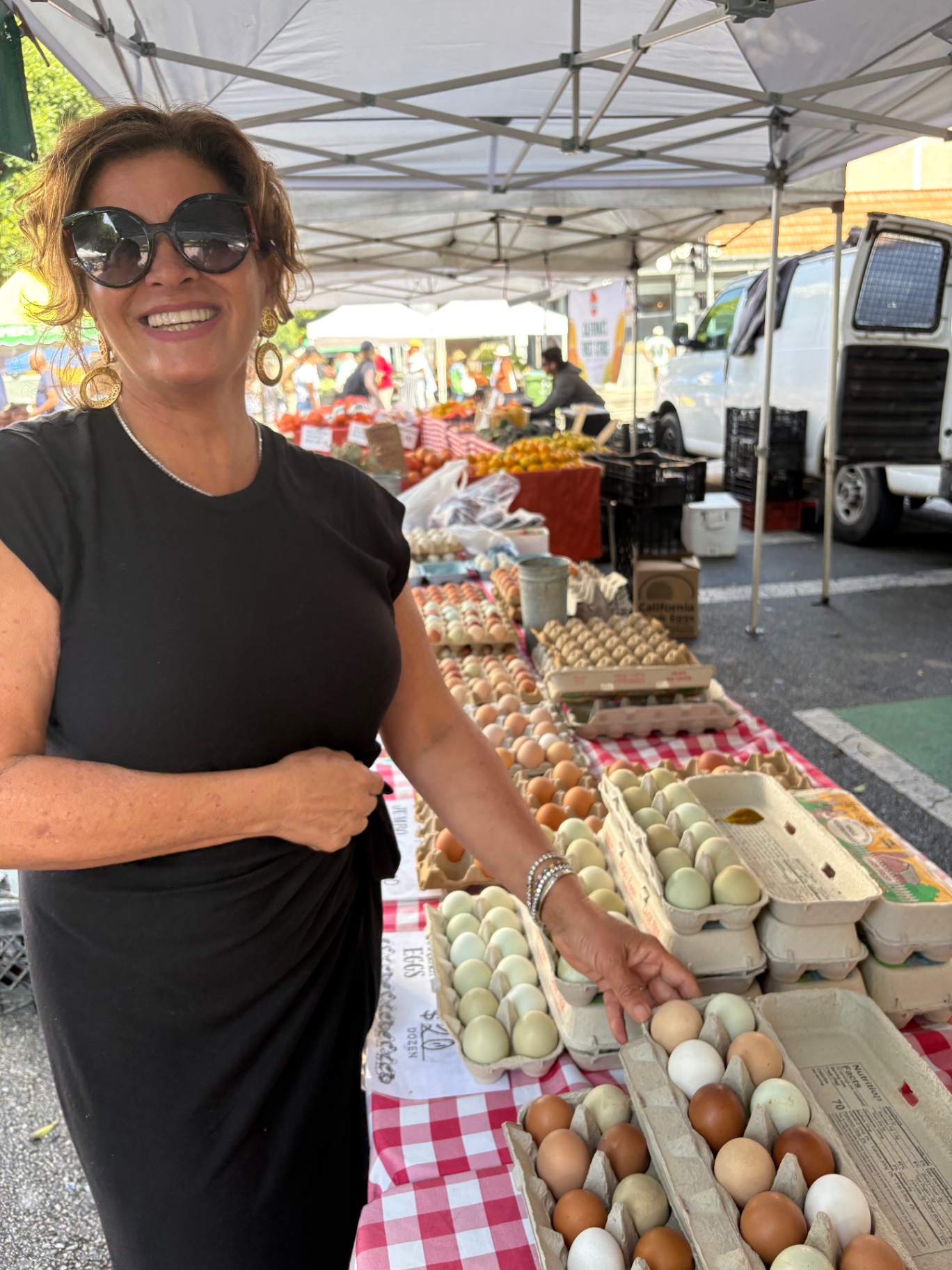 Fiona choosing farm eggs